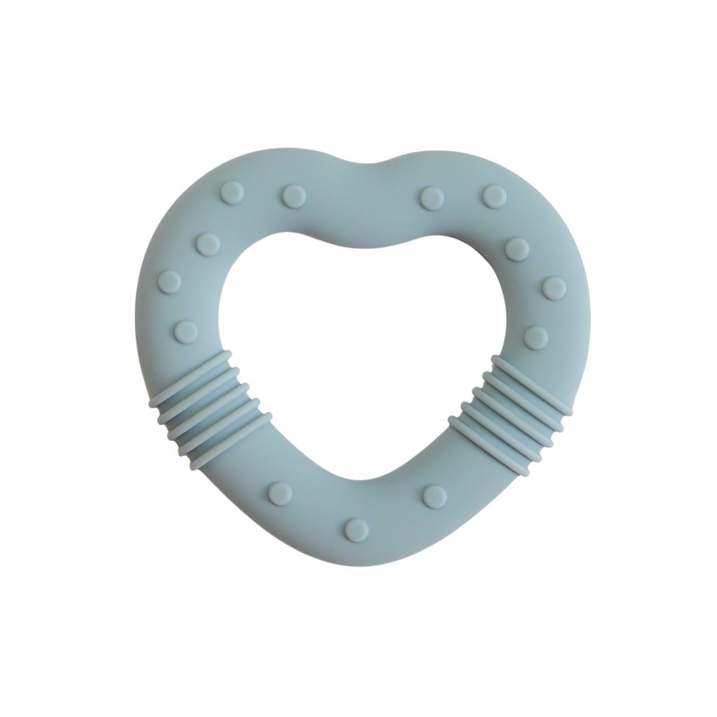 Heart-shaped blue teething ring on a white background