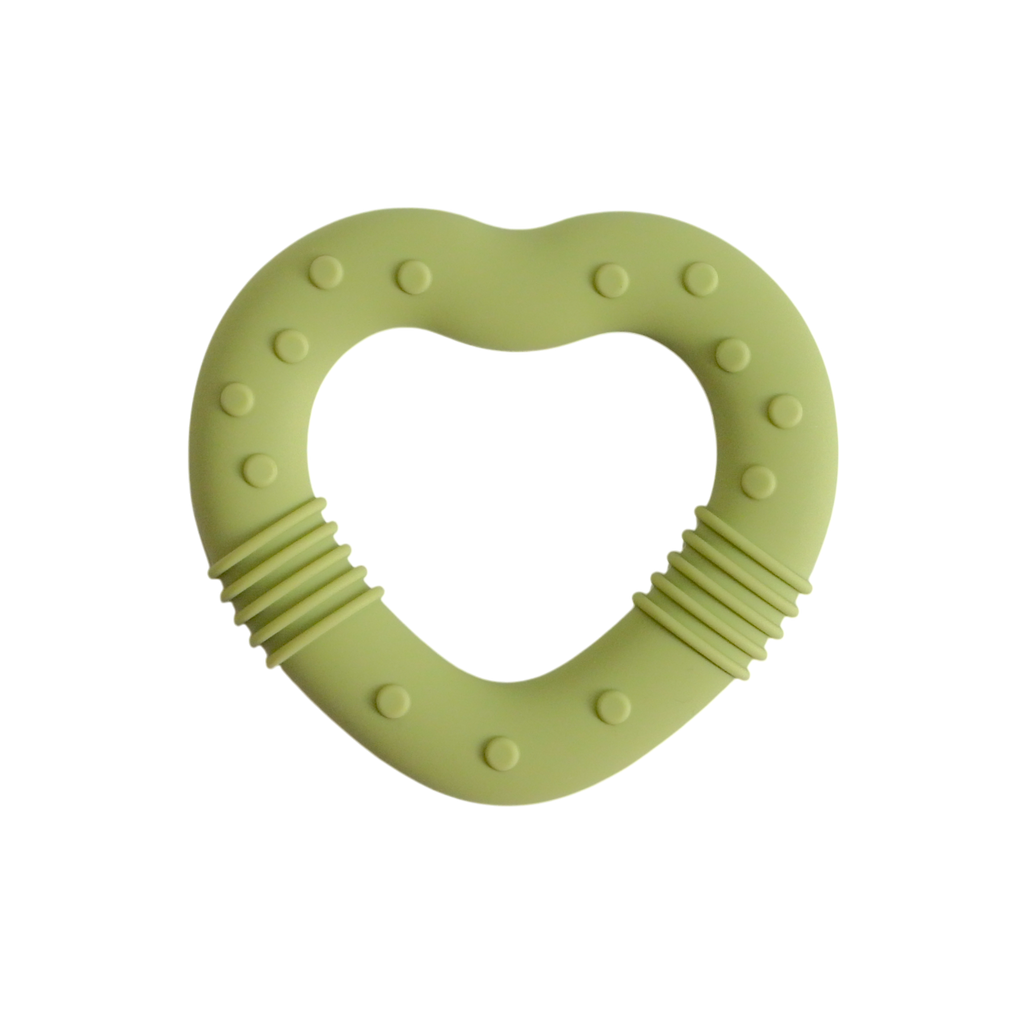Heart-shaped green teething ring on a white background